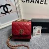 CHANEL Mini CC Clutch with Chain. Authentic Quality Clutch with literature, dust bag, box, CHANEL fabric flower, and authenticity card. This trendy CHANEL CC Clutch with Chain is crafted from quilted lambskin leather, features woven-in leather chain strap, logo metal plate, and aged gold-tone hardware. Its turn-lock closure opens to a black fabric interior with slip pockets.