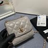 CHANEL Mini CC Clutch with Chain. Authentic Quality Clutch with literature, dust bag, box, CHANEL fabric flower, and authenticity card. This trendy CHANEL CC Clutch with Chain is crafted from quilted lambskin leather, features woven-in leather chain strap, logo metal plate, and aged gold-tone hardware. Its turn-lock closure opens to a black fabric interior with slip pockets.